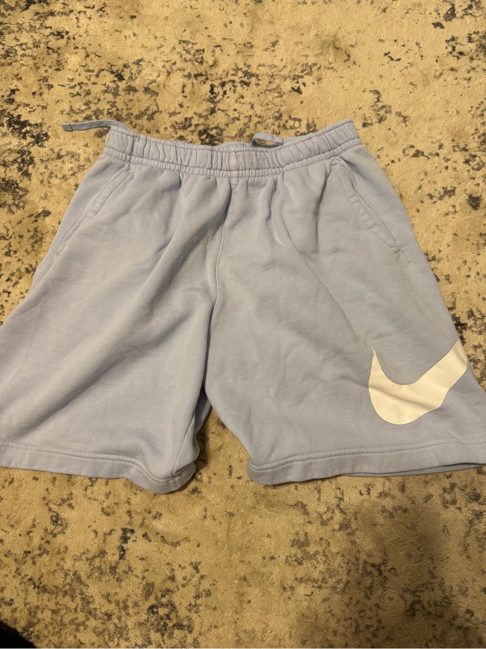 Nike Pale Blue Athletic Shorts with White Swoosh